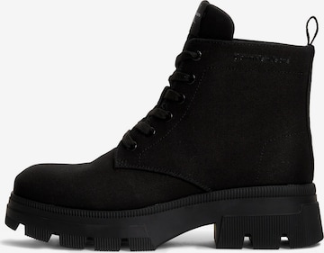 Calvin Klein Jeans Lace-Up Ankle Boots in Black: front