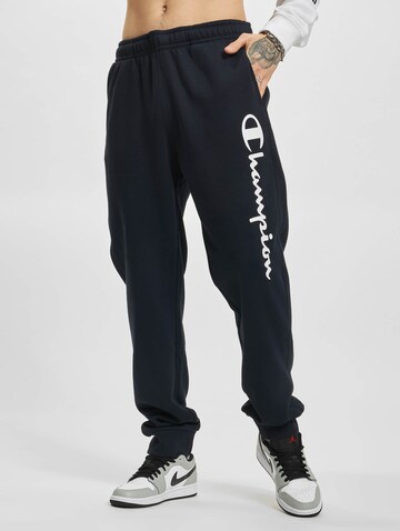 Effilé Pantalon Champion Authentic Athletic Apparel en bleu : devant