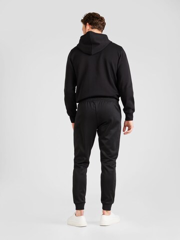 ELLESSE - Tapered Calças 'Bertoni' em preto