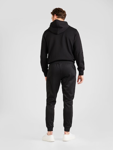 ELLESSE Tapered Trousers 'Bertoni' in Black