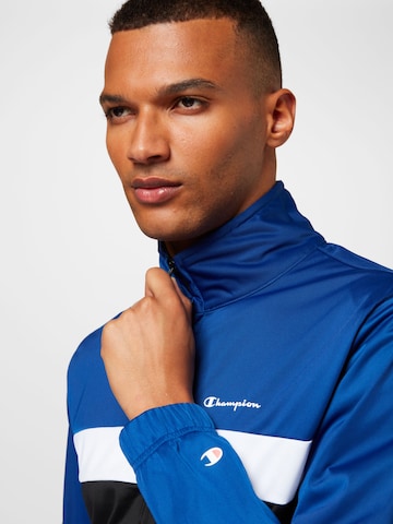 Champion Authentic Athletic Apparel Trainingspak in Blauw