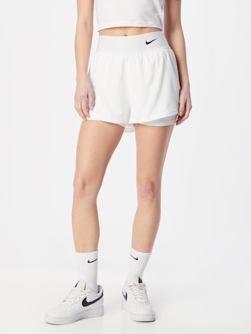 NIKE Regular Sports trousers in White: front