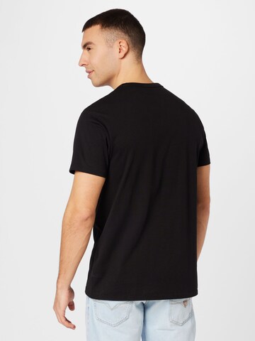 GUESS T-Shirt in Schwarz