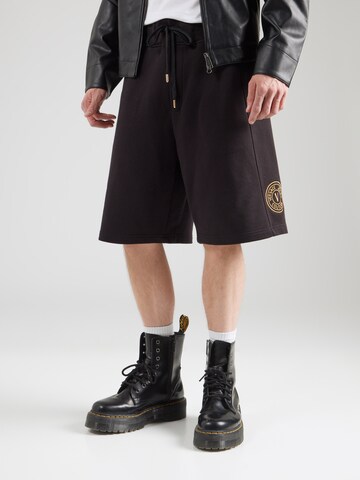 Wide leg Pantaloni di Versace Jeans Couture in nero: frontale