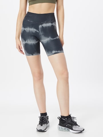 NIKE Skinny Sportbroek in Zwart: voorkant