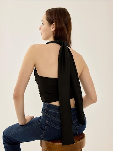 Top in maglia di Hiccup in nero