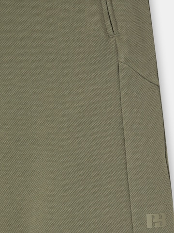 Pull&Bear Lużny krój Spodnie w kolorze zielony
