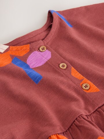 Rochie de la Next pe portocaliu