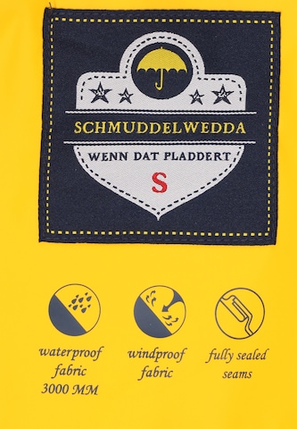 Schmuddelwedda - Abrigo funcional en amarillo