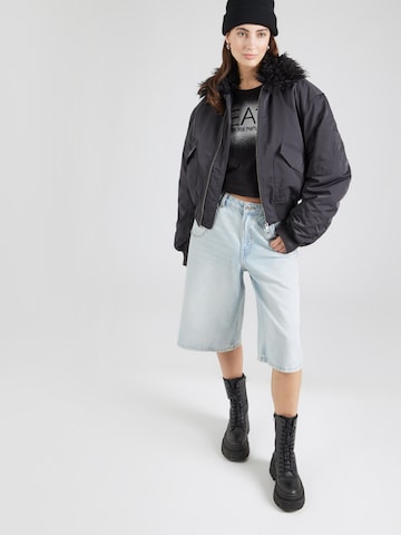 Tricou de la EA7 Emporio Armani pe negru