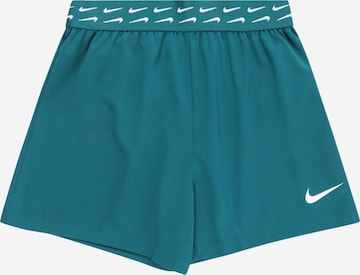 NIKE Regular Sports trousers in Green: front