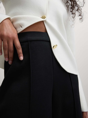 Loosefit Pantaloni di Marks & Spencer in nero