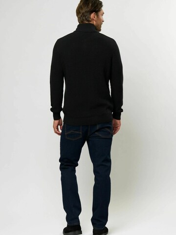 U.S. POLO ASSN. Neulepaita 'Rafael' värissä musta