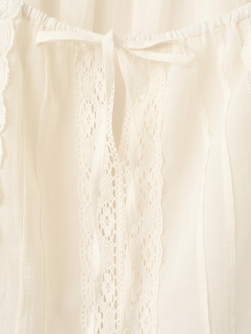 MANGO - Blusa 'EVA' en beige
