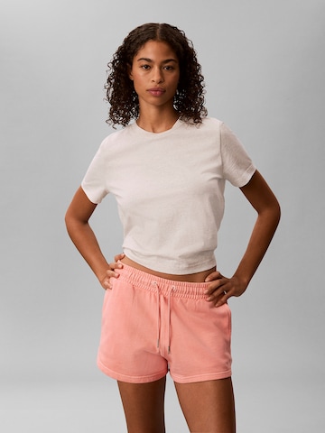 Regular Pantalon Calvin Klein Jeans en rose : devant