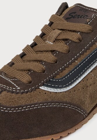 Baskets basses VANS en marron