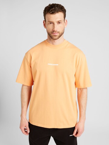 Pegador - Camiseta 'COLNE' en naranja: frente