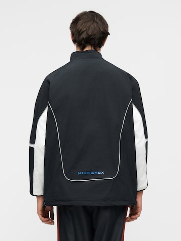 Nike Sportswear Övergångsjacka 'SHOX' i svart