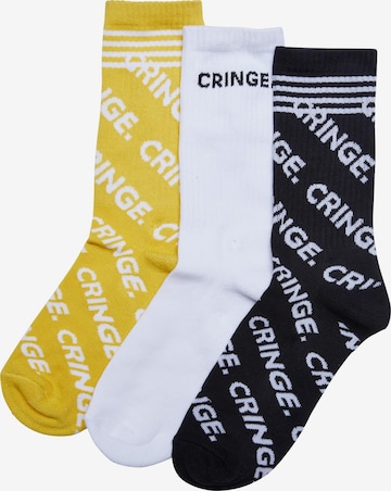 Chaussettes 'Cringe' Mister Tee en jaune : devant