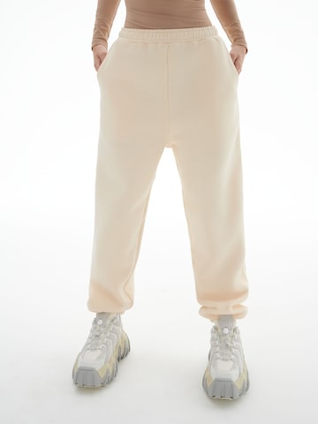 LENI KLUM x ABOUT YOU Loose fit Pants 'Lea' in White: front