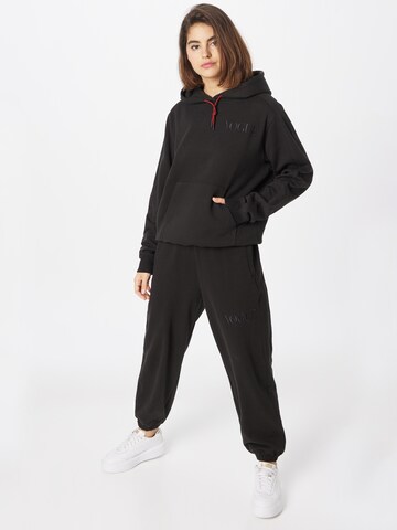 PUMA Sweatshirt 'x Vogue Collection' in Black