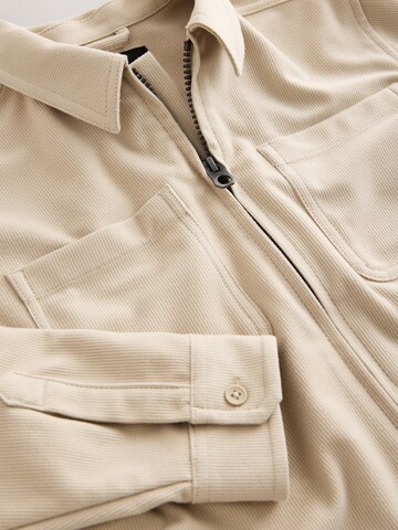 Next Tussenjas in Beige