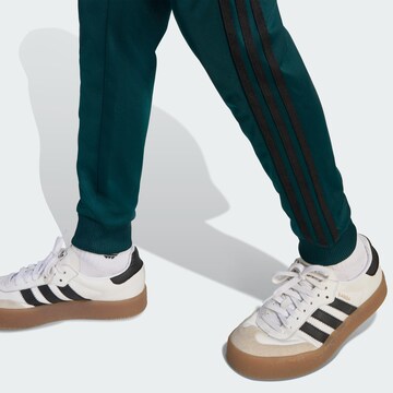 ADIDAS ORIGINALS Tapered Trousers 'Adicolor Sst' in Green