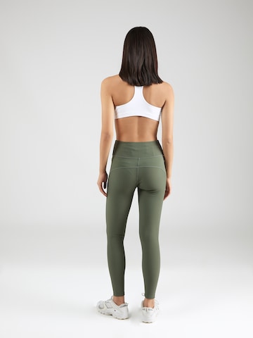 Juicy Couture Sport Skinny Športne hlače 'LORRAINE' | zelena barva