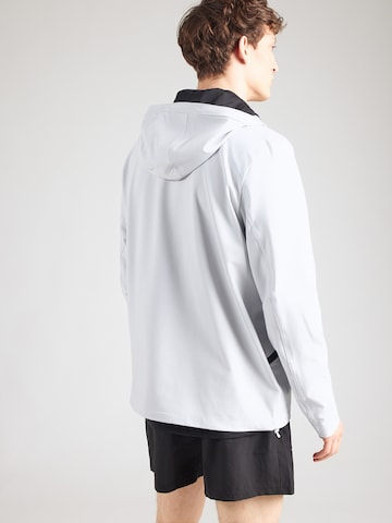 UNDER ARMOUR - Chaqueta deportiva 'Unstoppable' en gris