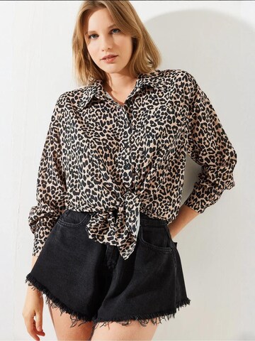 Bianco Lucci Blouse in Beige: front