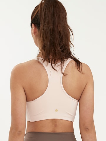 Athlecia Bustier Biustonosz sportowy 'Inere' w kolorze różowy