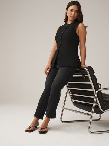 Bootcut Jeans di Next in nero