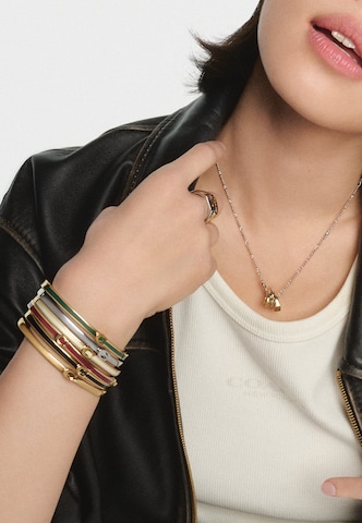 COACH - Pulsera en oro