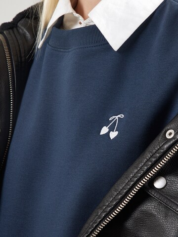 QS - Sudadera en azul