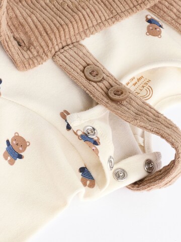 Set Next en marron
