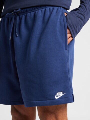 Nike Sportswear Loosefit Kalhoty 'CLUB' – modrá