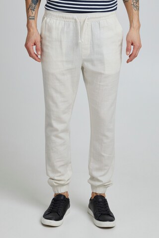 11 Project Slim fit Pants in Beige: front