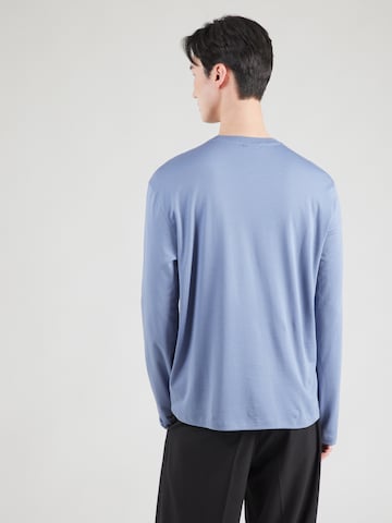 Calvin Klein Μπλουζάκι σε μπλε: πίσω