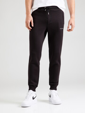 Tapered Pantaloni di Calvin Klein Jeans in nero: frontale