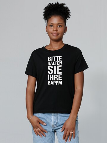 Maglietta 'Bitte Halten Sie Ihre Bappm' di Watapparel in nero: frontale
