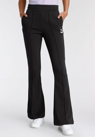PUMA Rozkloszowany krój Spodnie 'Classics' w kolorze czarny: przód