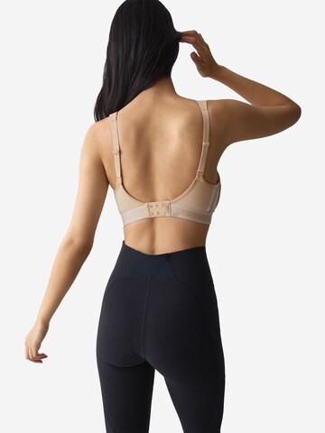 TRIUMPH Bralette Sports bra ' Triaction Cardio Breeze ' in Beige