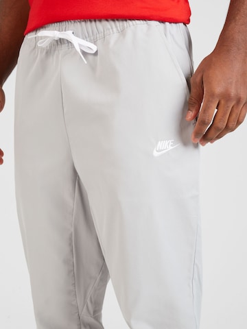 Nike Sportswearregular Hlače 'CLUB' - siva boja