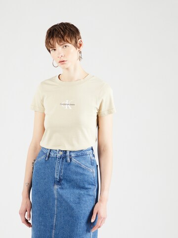 Calvin Klein Jeans Štandardný strih Tričko - Béžová: predná strana