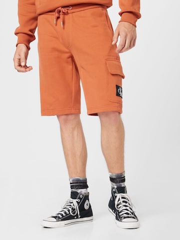 Regular Pantalon Calvin Klein Jeans en orange : devant