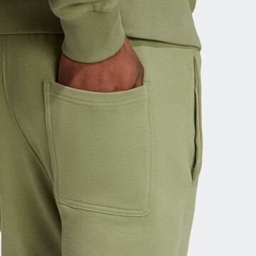 ADIDAS SPORTSWEAR Tapered Hose in Grün
