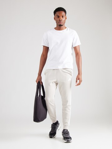 ADIDAS SPORTSWEAR Tapered Παντελόνι φόρμας 'Essential' σε γκρι