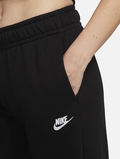 NIKE Sports trousers in Black / White, Item view