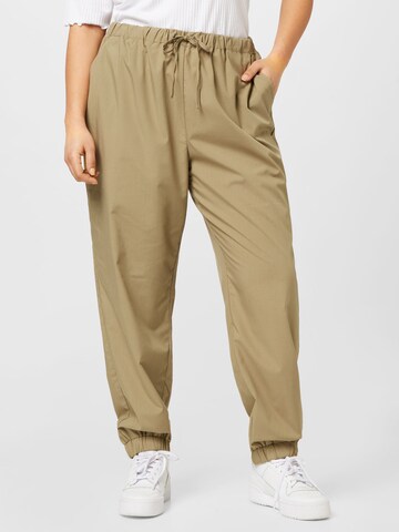 ONLY Carmakoma Tapered Trousers in Green: front