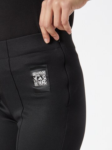 ADIDAS SPORTSWEARFlared/zvonoliki kroj Sportske hlače 'Karlie Kloss' - crna boja